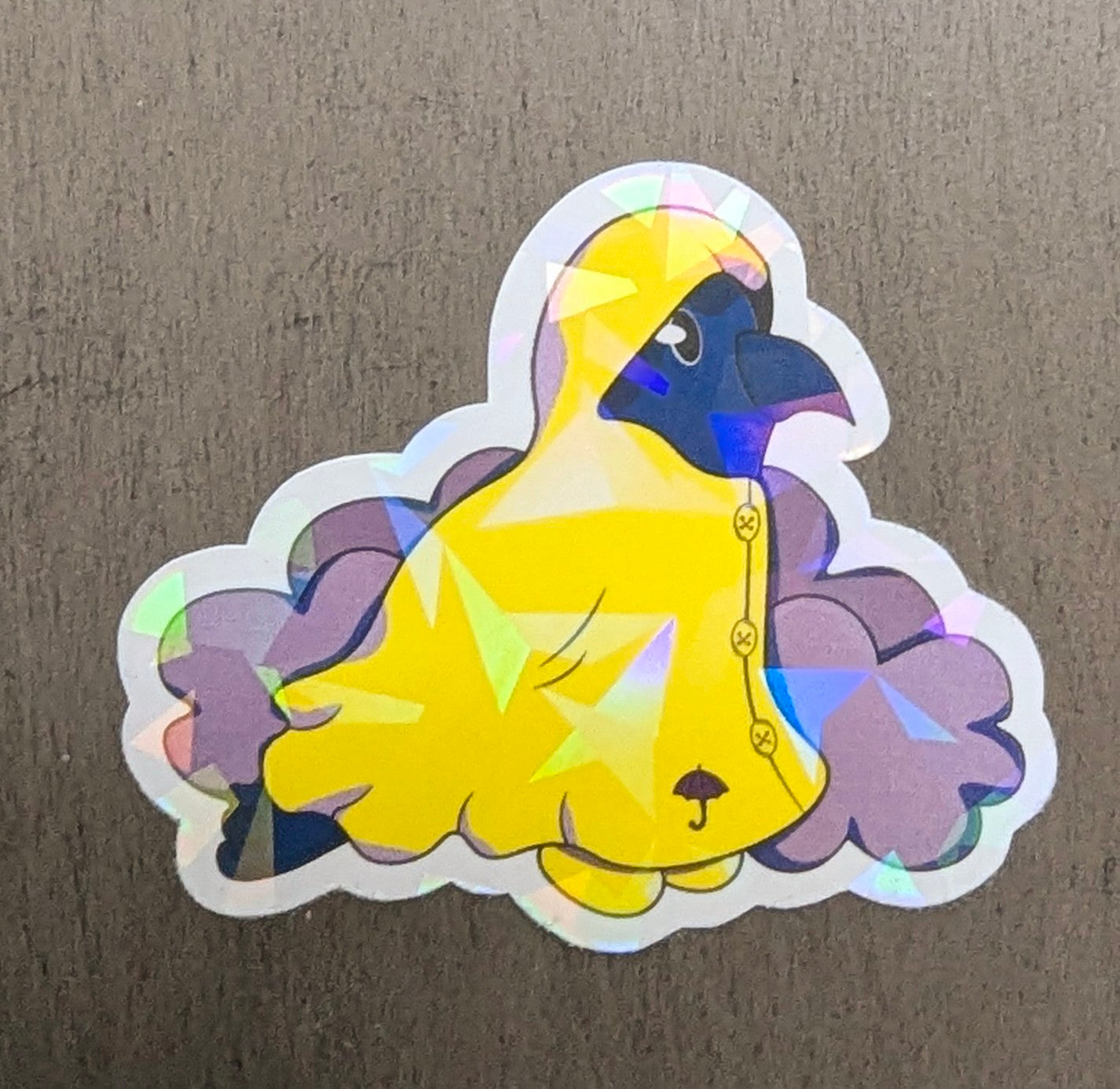 2" Holographic Raincoat Crow Sticker