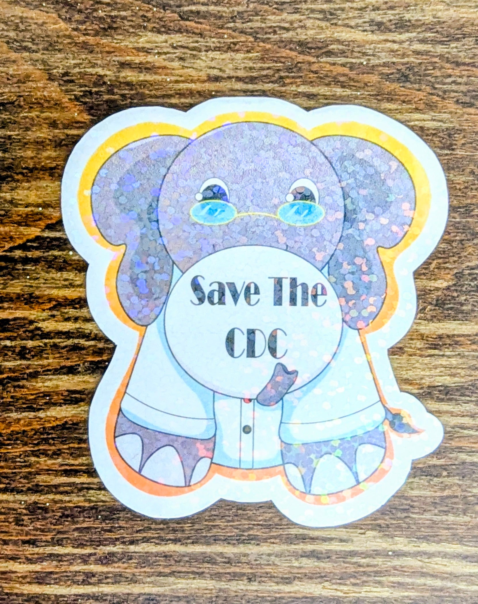 3" Holographic Save the CDC Elephant Scientist (orange and yellow outline)